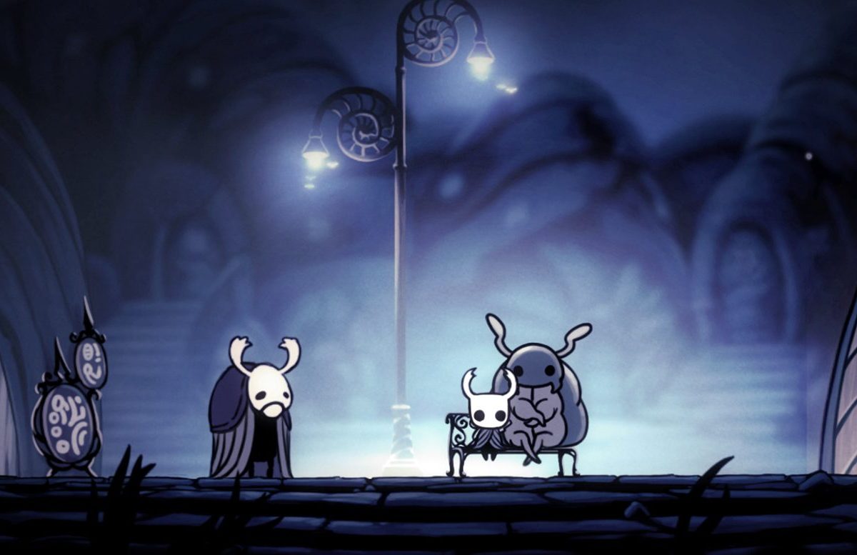 Ein Screenshot aus dem Spiel Hollow Knight, der Insekten-Charaktere unter einer Straßenlaterne zeigt