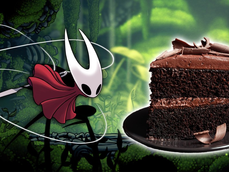 Ein Screenshot von Hollow Knight Silksong mit einem Stück Schokokuchen darauf.