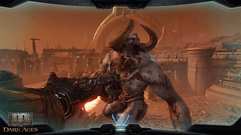 Screenshot aus Doom: The Dark Ages. Der Atlan-Mech haut auf einen riesigen Dämonen.