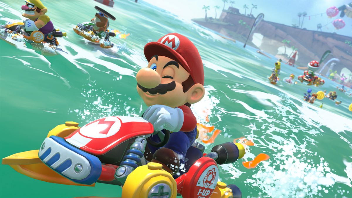 Screenshot aus Mario Kart World mit Charakteren die über Wasser fahren